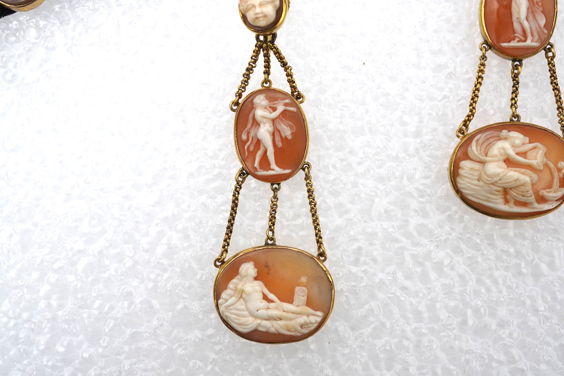 A pair of shell cameo earrings and bracelet, 19th century